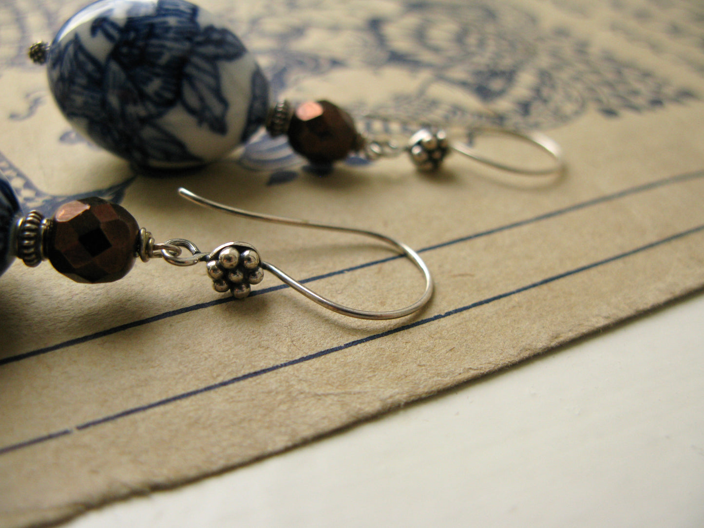 Decorative silver earrings hooks closeup