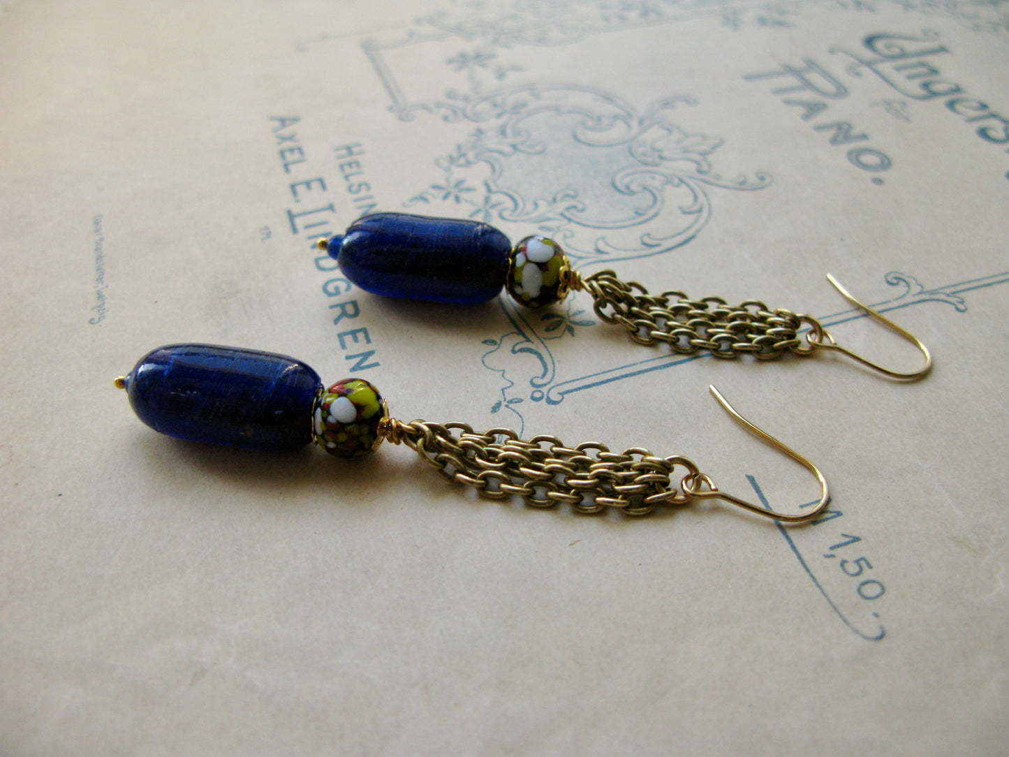 Par Avion long earrings