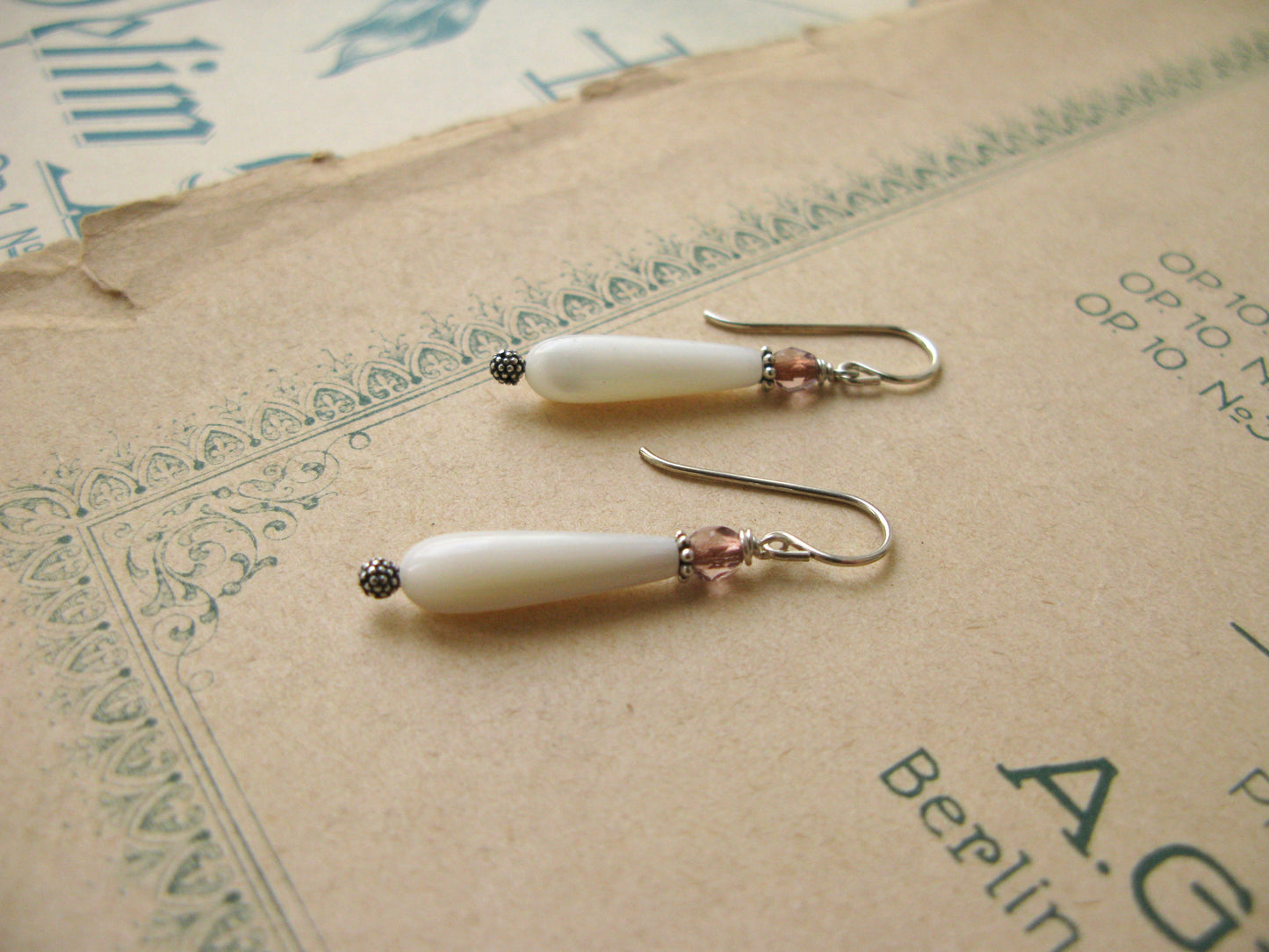 Magnolia hook earrings in white