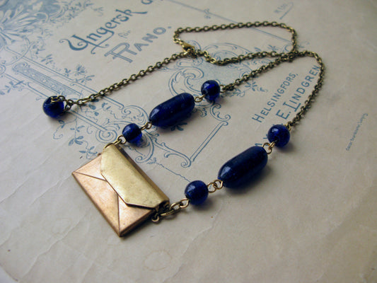 Par Avion necklace in navy