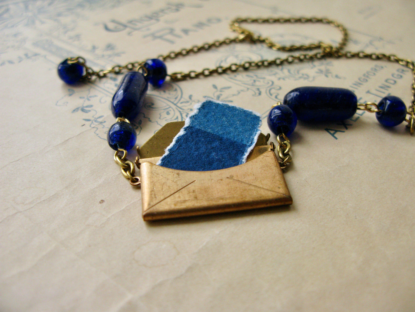 Par Avion necklace in navy