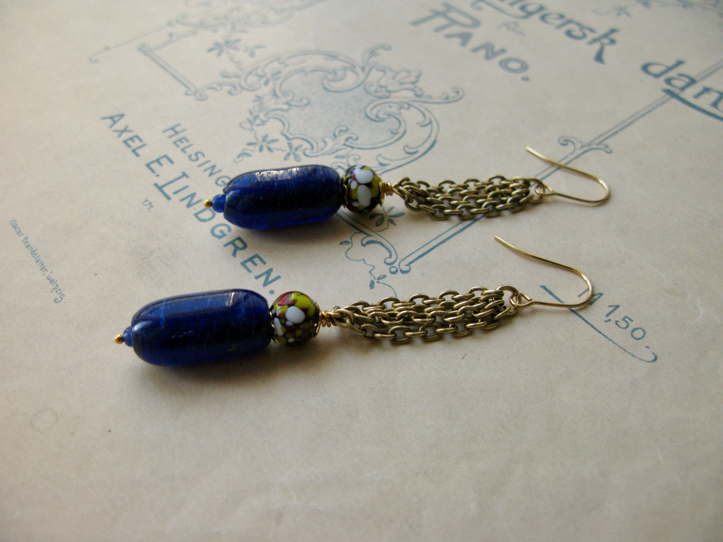 Par Avion long earrings