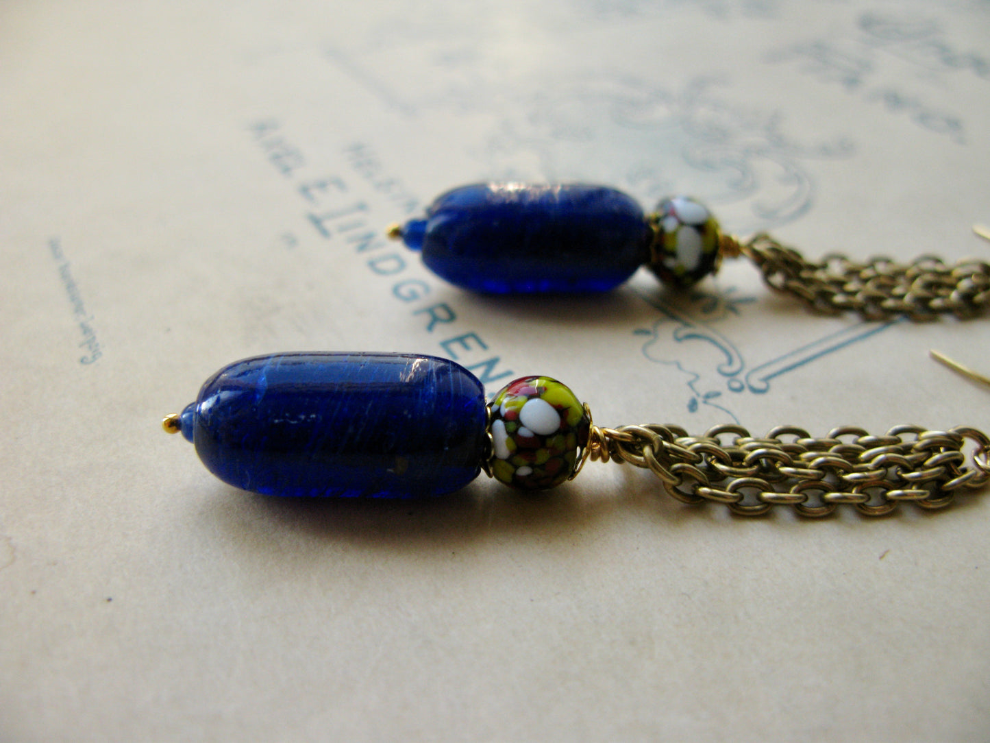 Par Avion long earrings