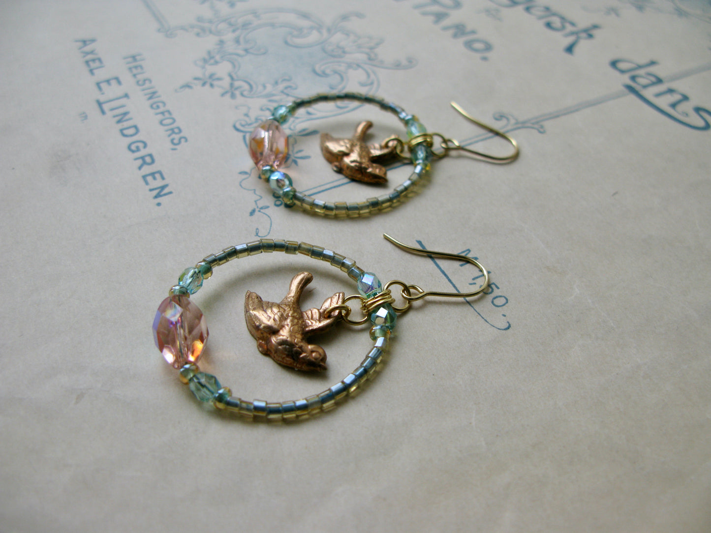 Lark glass hoop earrings in light green