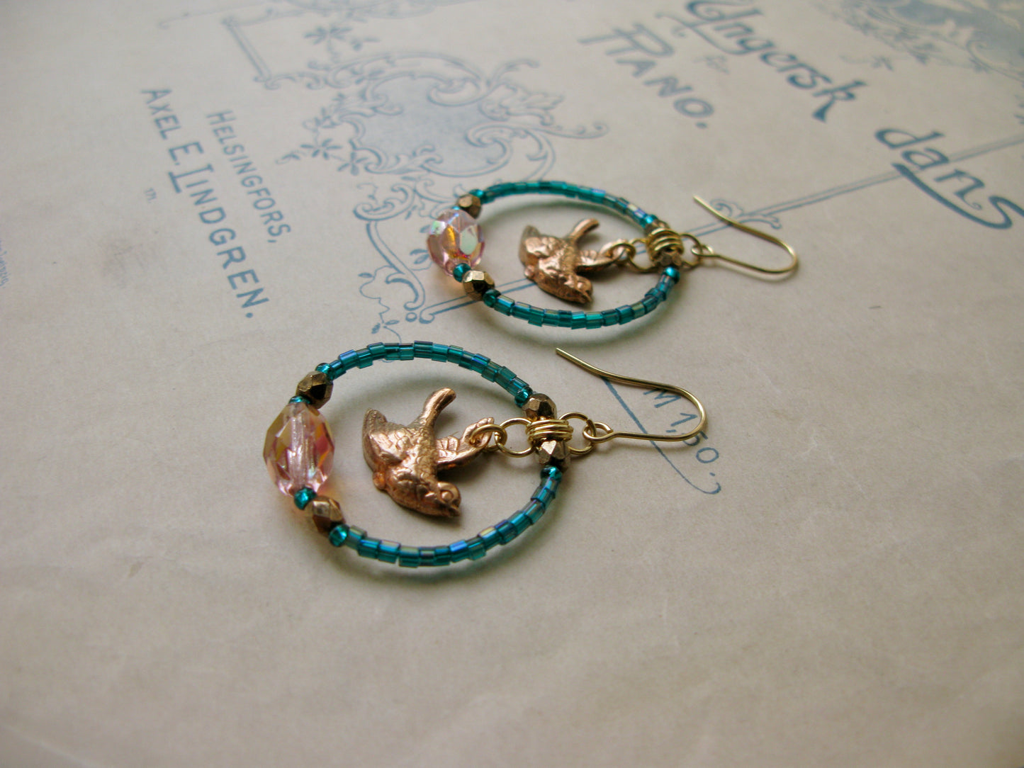 Lark glass hoop earrings in peacock green