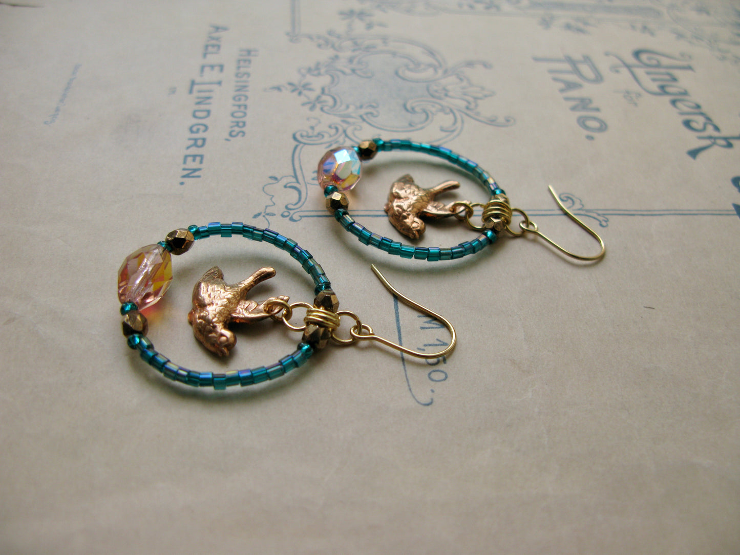 Lark glass hoop earrings in peacock green