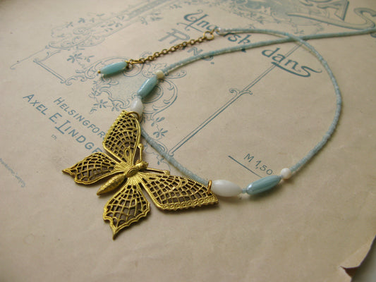 Papillon necklace in aqua + white