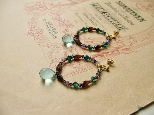 Suits large hoop earrings