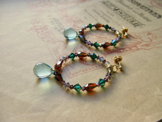 Suits large hoop earrings