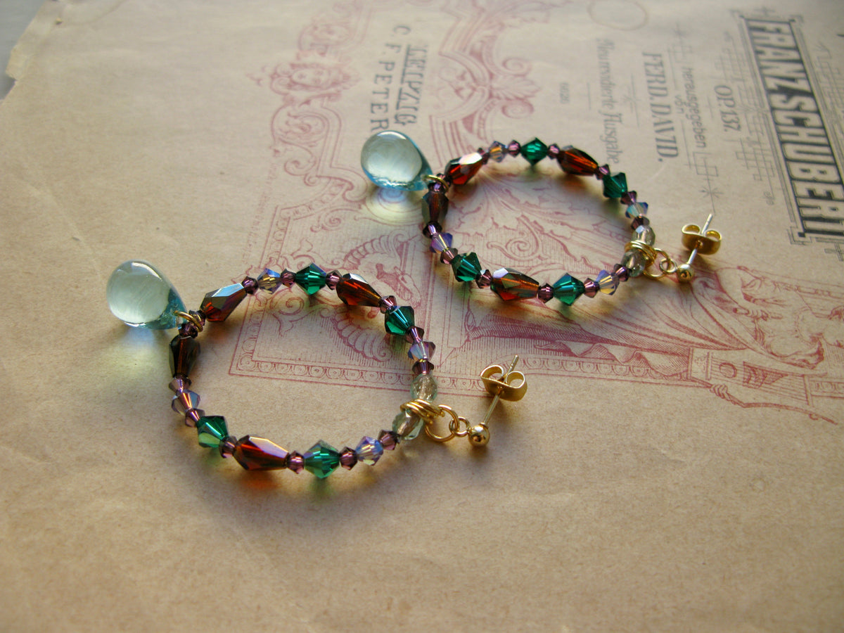 Suits large hoop earrings