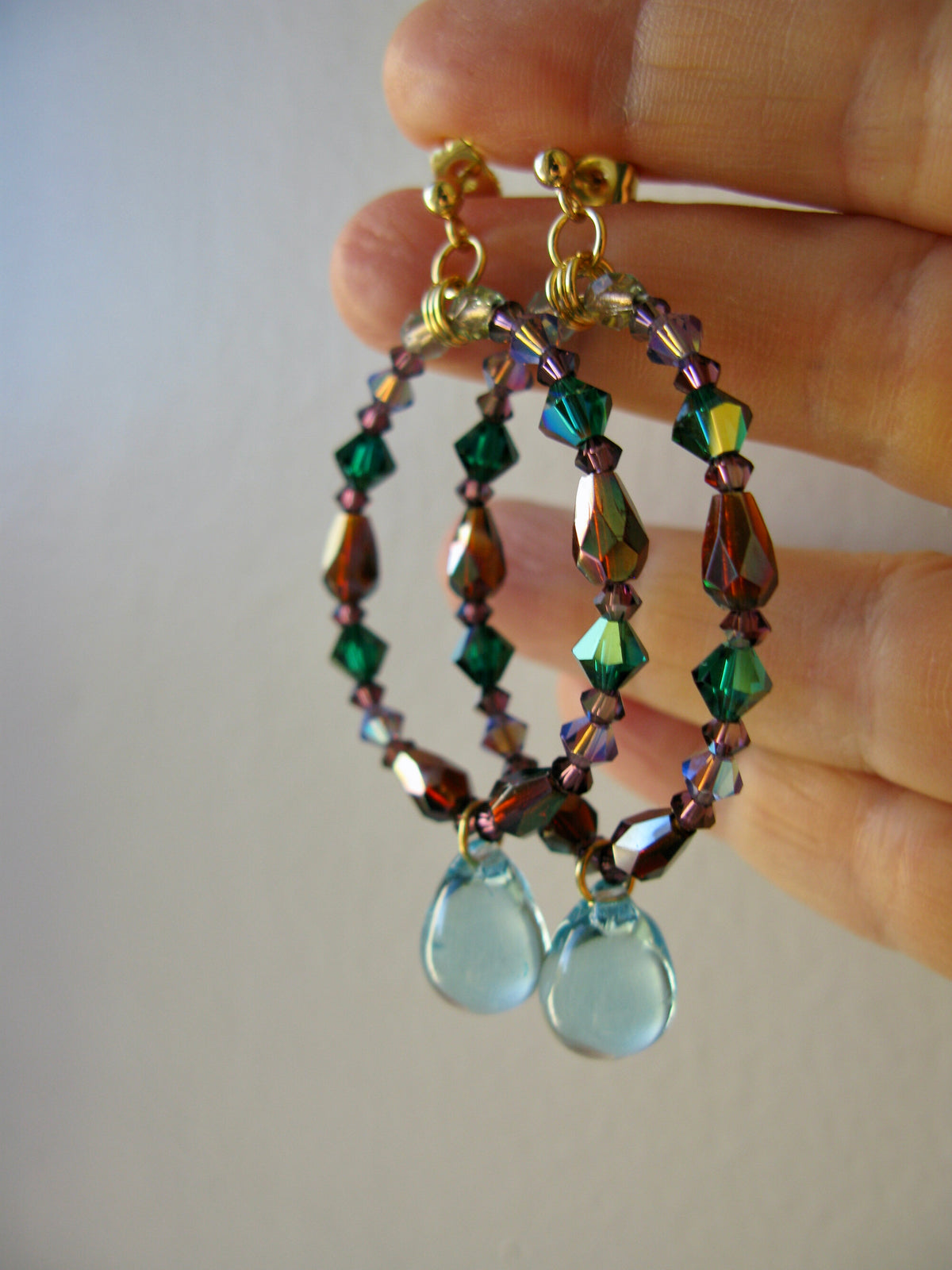 Suits large hoop earrings