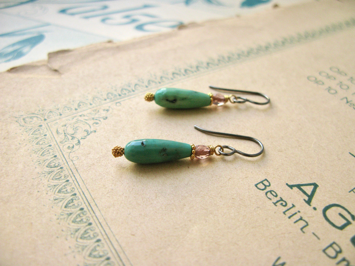 Magnolia hook earrings in green